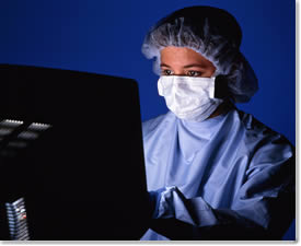 Image of a Female working on a Computer